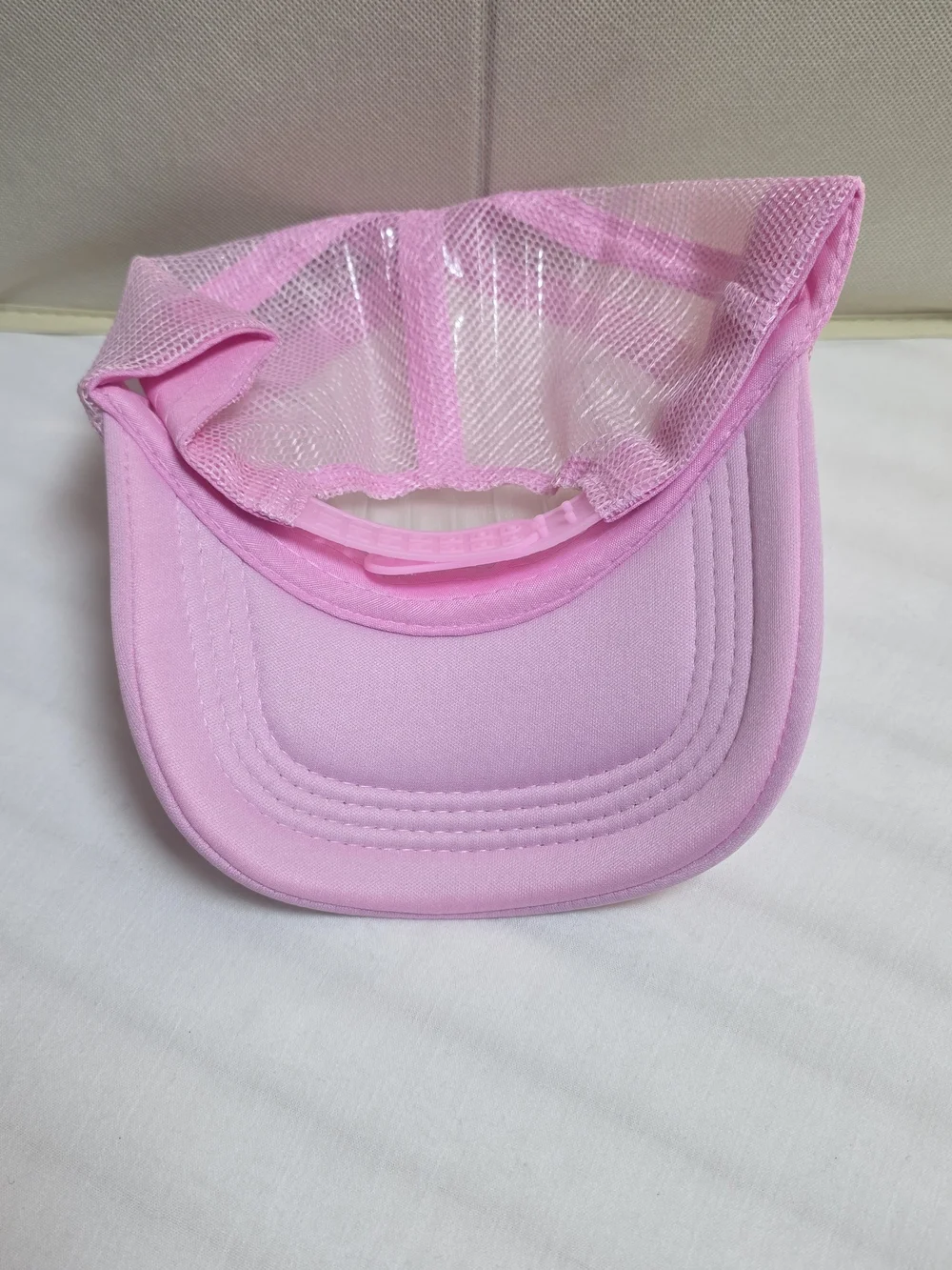 0911 Put It On My Husband's Tab Pink Trucker Hat